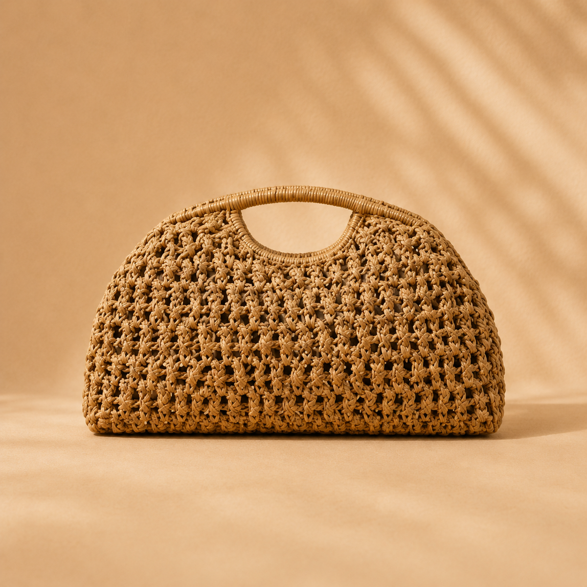 BOLSO DE MANO TRENZADO